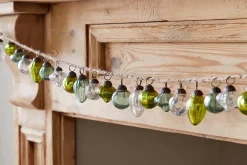 Wreaths & Garlands|Baubles & Tree Decorations^Nkuku Ekiti Bauble Garland - Mixed Green & Clear